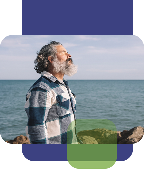 Man Enjoying Ocean Breeze