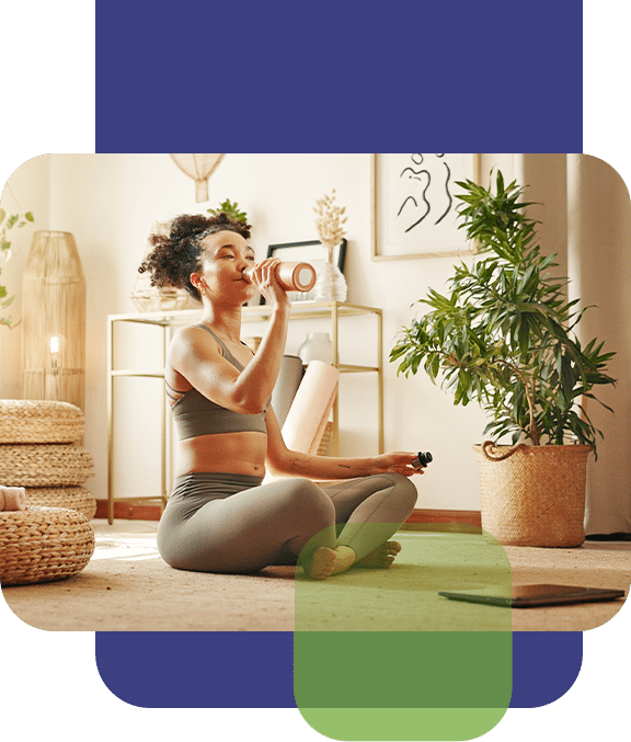 Woman Drinking Water After Yoga
